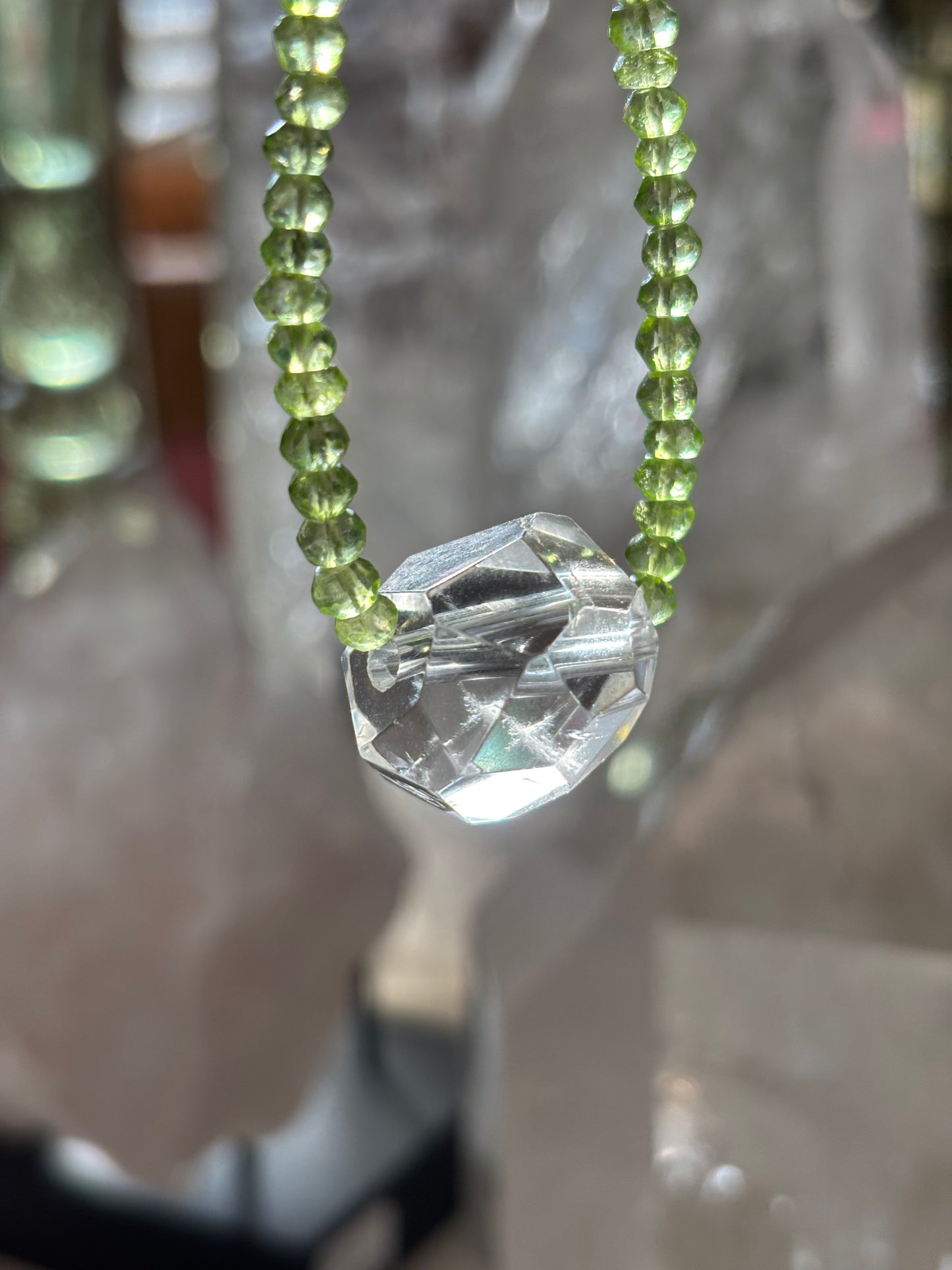 Awaken Light — Peridot with Faceted Lemurian Quartz Gem
