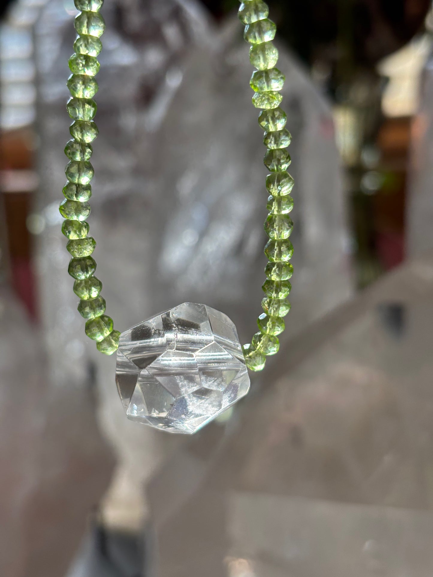 Awaken Light — Peridot with Faceted Lemurian Quartz Gem